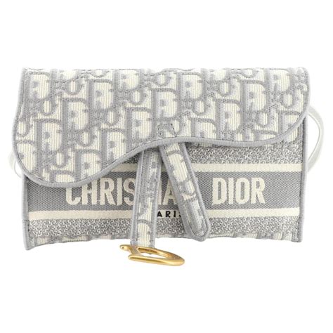 saddle slim pouch dior|Dior saddle pouch review.